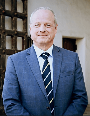 District Attorney John T. Savrnoch